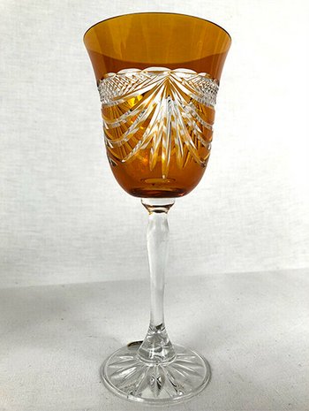 Set of five colored cut crystal stemware