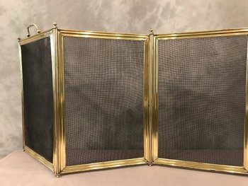 Antique brass fireplace mantel from the 19th century Louis Philippe period