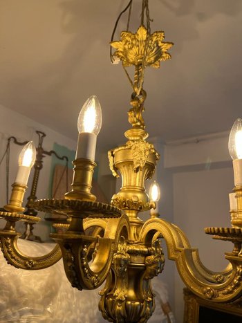 Gilded Bronze Chandelier of Renaissance style XIXth century decorated with heads of Mascaron