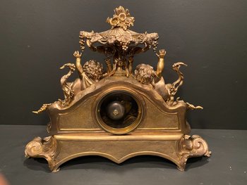 Importante pendule rocaille en bronze, XIX° siècle