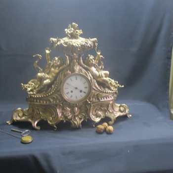 Importante pendule rocaille en bronze, XIX° siècle