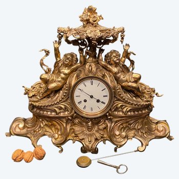 Importante pendule rocaille en bronze, XIX° siècle