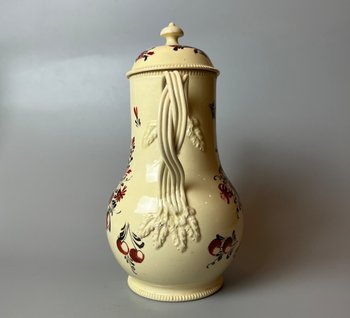 A late 18thc floral painted creamware coffee pot. Perhaps Yorkshire. c.1770