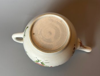 A rare & charming Bow miniature teapot, c1760, bullet form, polychrome decorated