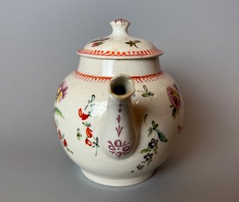 A rare & charming Bow miniature teapot, c1760, bullet form, polychrome decorated