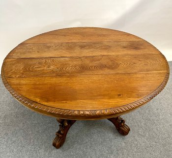 Table de chasse ovale en chêne foret noire à décor de dragon