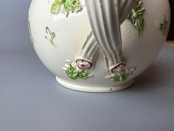 A Leeds Creamware Ovoid Teapot and Cover, c.1775,  with entwined handles.