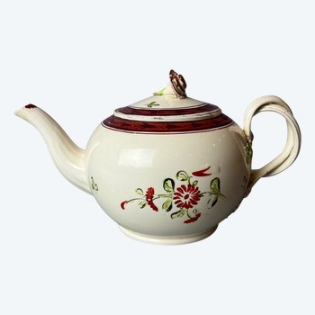 A Leeds Creamware Ovoid Teapot and Cover, c.1775,  with entwined handles.