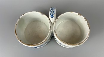 A rare mid 18thc Worcester "Gazebo" pattern coffee cup c1755-9