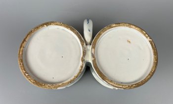 A rare mid 18thc Worcester "Gazebo" pattern coffee cup c1755-9