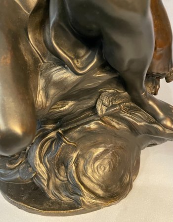 Sculpture en bronze"Mercure attachant ses talonnières". J-B Pigalle. (Hermès).