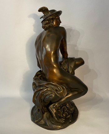 Sculpture en bronze"Mercure attachant ses talonnières". J-B Pigalle. (Hermès).