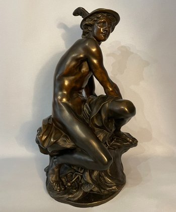 Sculpture en bronze"Mercure attachant ses talonnières". J-B Pigalle. (Hermès).