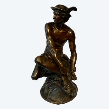 Sculpture en bronze"Mercure attachant ses talonnières". J-B Pigalle. (Hermès).