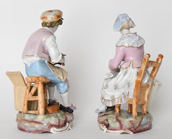Pair of statuettes representing a couple working