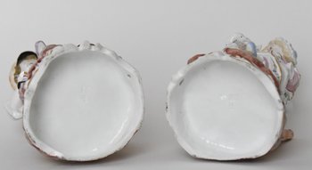 Pair of statuettes representing a couple working