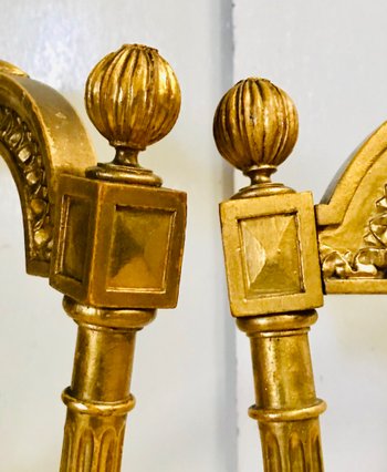 Pair of gilded wooden chairs