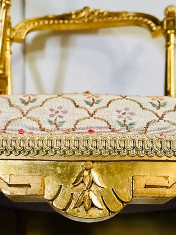 Pair of gilded wooden chairs