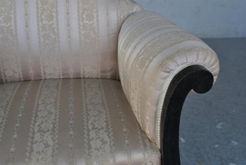 Coppia di poltrone Art Déco in legno annerito e seta