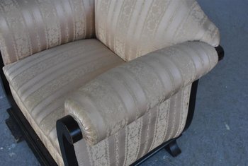 Coppia di poltrone Art Déco in legno annerito e seta