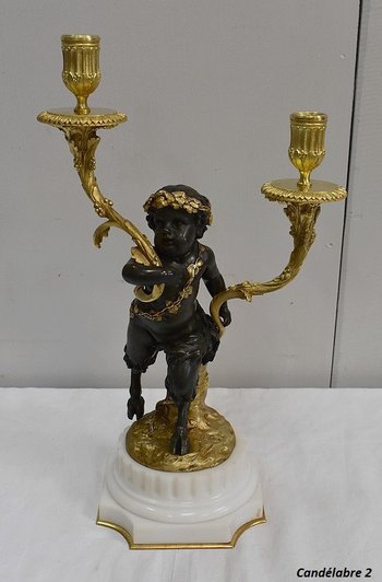 Coppia di candelabri in bronzo "Un Amour et un Faune", da Clodion e Delarue - Fine XIX secolo