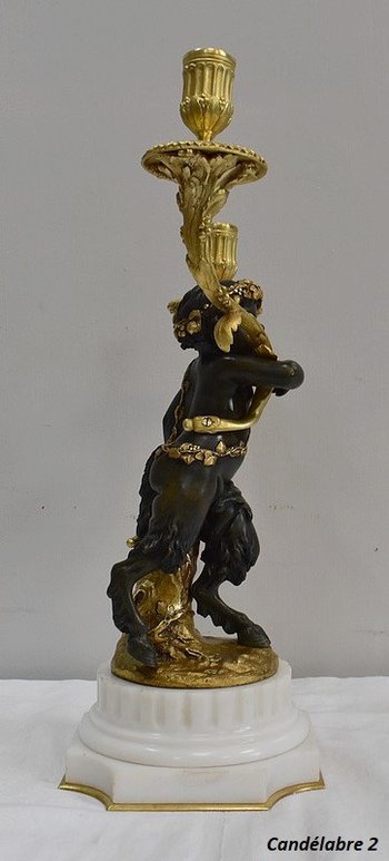 Coppia di candelabri in bronzo "Un Amour et un Faune", da Clodion e Delarue - Fine XIX secolo