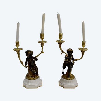 Coppia di candelabri in bronzo "Un Amour et un Faune", da Clodion e Delarue - Fine XIX secolo