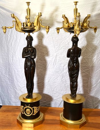 Pair of very important candelabra of Empire period in patina and gilt bronze