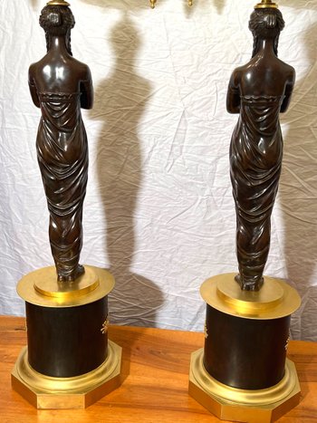 Pair of very important candelabra of Empire period in patina and gilt bronze