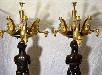 Pair of very important candelabra of Empire period in patina and gilt bronze