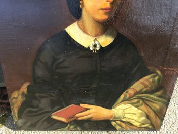 Porträt einer Frau mit einem Buch.1860