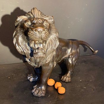 bronze walking lion