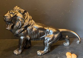 bronze walking lion