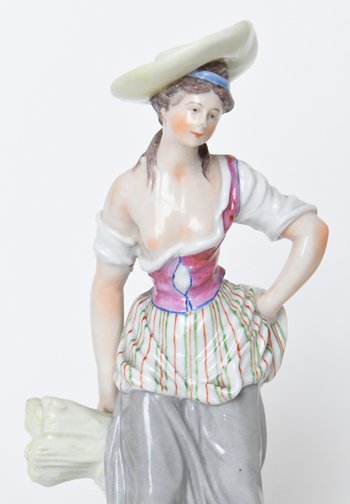 Pair of porcelain statuettes of Samson representing a couple of peasants
