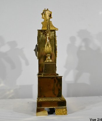 Orologio in bronzo dorato - Inizio XIX secolo