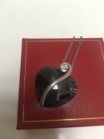 Ciondolo in argento con ematite tagliata e diamante