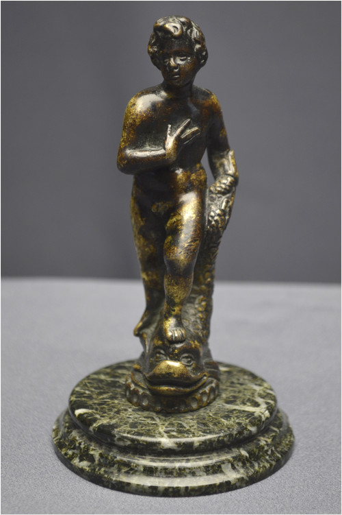 Italia, periodo rinascimentale, XVI secolo, Satuetta in bronzo raffigurante un giovane con delfino