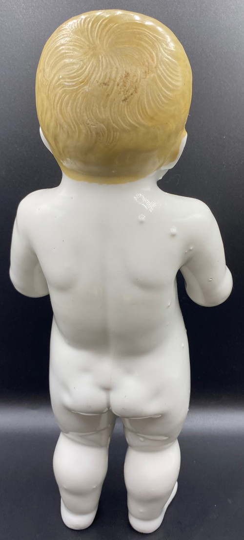 CHILD IN FOOT PORCELAIN