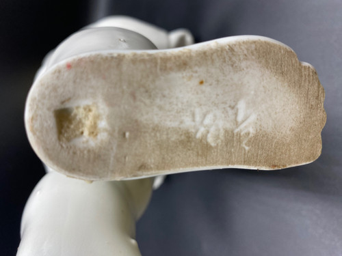CHILD IN FOOT PORCELAIN