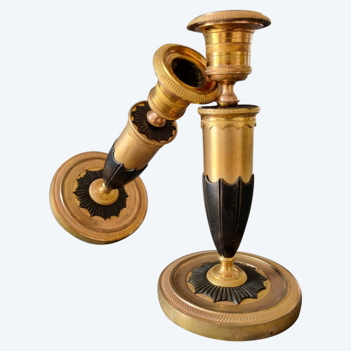 Empire period, Rare pair of ormolu and patinated torches.