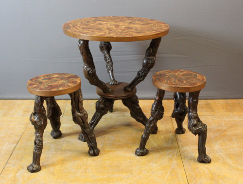 Pedestal table and its stools brutalist in vine stock around 1950