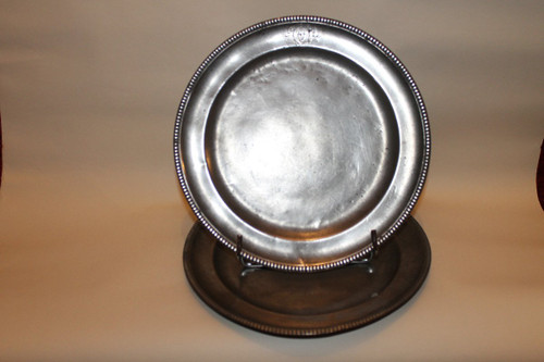 Pair of plates with a beaded edge in punched pewter by Laurent Morand in Lyon, 17th century