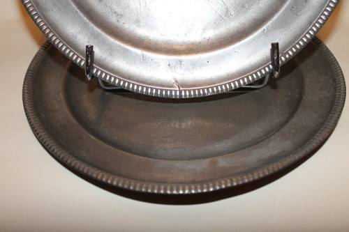 Pair of plates with a beaded edge in punched pewter by Laurent Morand in Lyon, 17th century