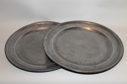 Pair of plates with a beaded edge in punched pewter by Laurent Morand in Lyon, 17th century