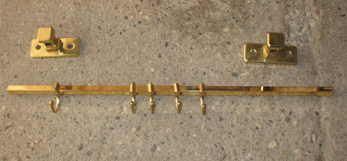 Wandregal für Küchen- oder Badutensilien aus Messing und Bronze. Art Deco