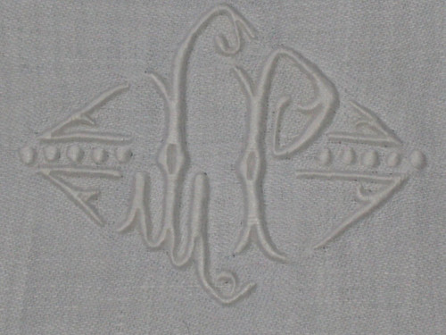 11 damask napkins decorated with iris and lily of the valley embroidered initials LP