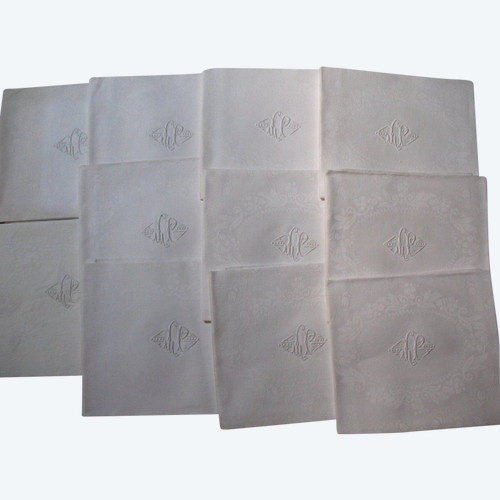 11 damask napkins decorated with iris and lily of the valley embroidered initials LP