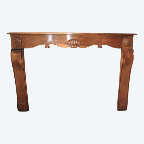 Crossbow-shaped fireplace and curved legs in walnut, Art Deco period