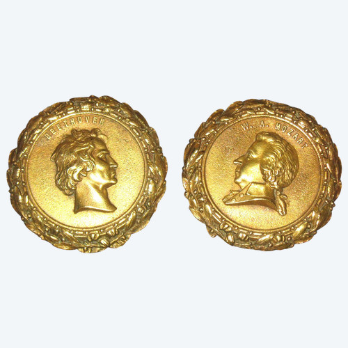 Pair of Louis XVI style bronze medallions with the effigy of Mozart and Beethoven, 19th century