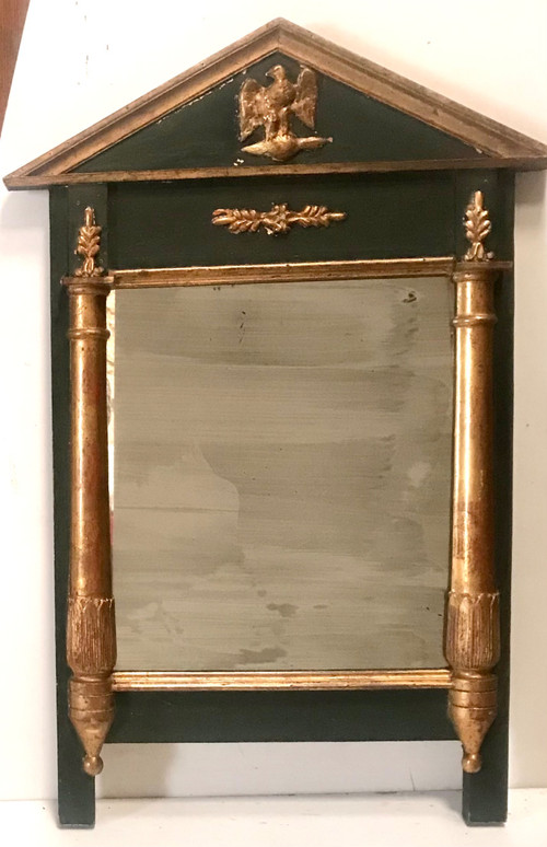 Miroir en bois doré et teinté de style Empire XIXème 